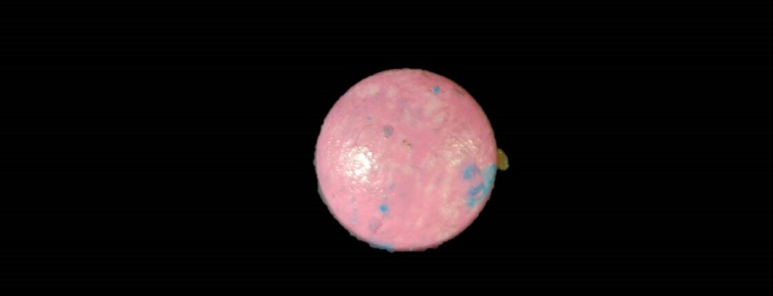 Dieses Bild zeigt eine pinke Pille.